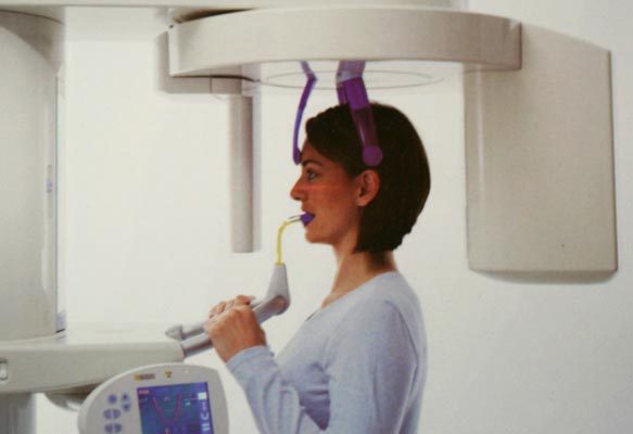 Patient receiving digital dental X-ray at Apex Dental Group in Apex