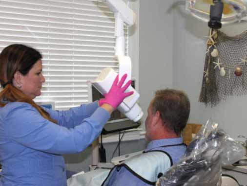 Dental Hygienist takes Bitewing Xray